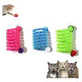 Cat playing with a spring and mesh tube toy set
